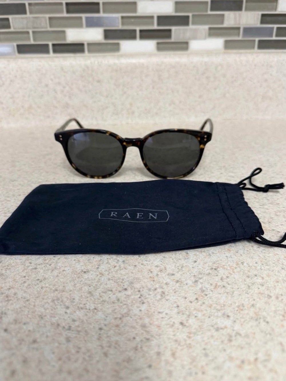 RAEN Tortoiseshell Round Sunglasses with Dark Lenses